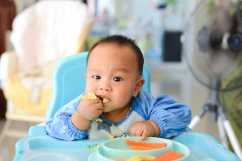 Baby weaning - eating in high chair