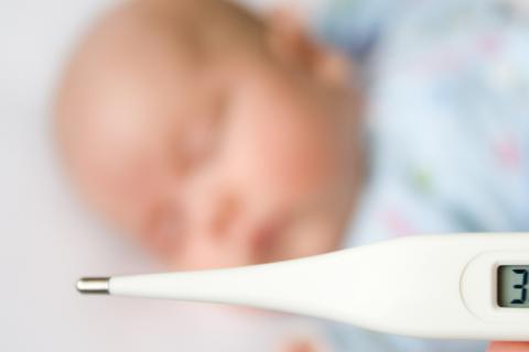 Baby and thermometer