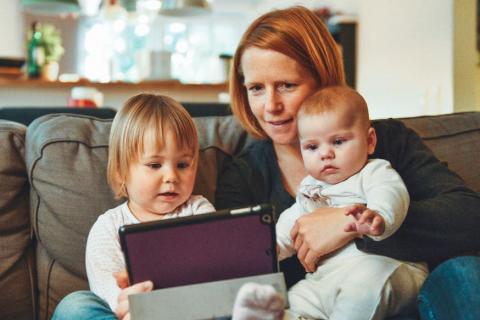 Family watching ipad