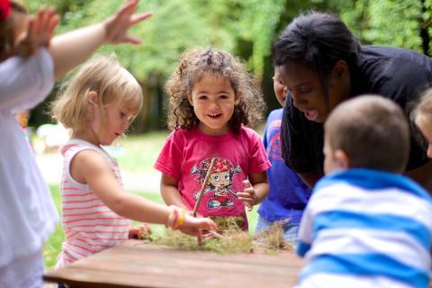 children crafting outdoors, early years education and play