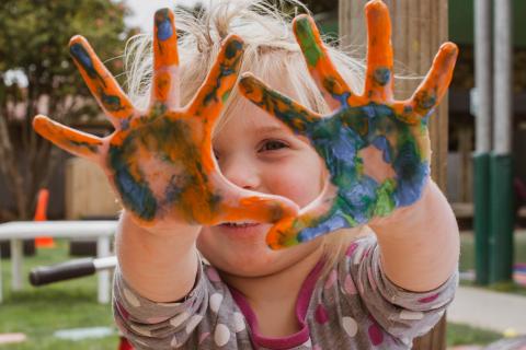 Child with paint on his hands