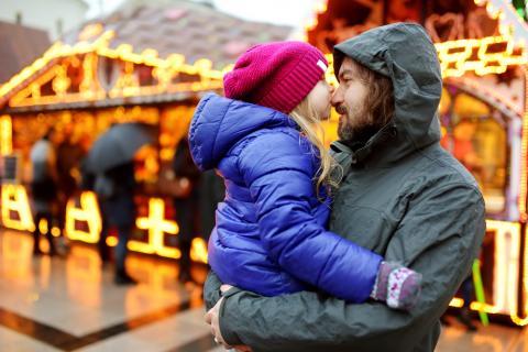 Single parent dad with his daughter at Christmas time