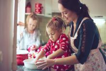 Mother cooking with children