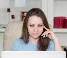 Woman concentrating on computer