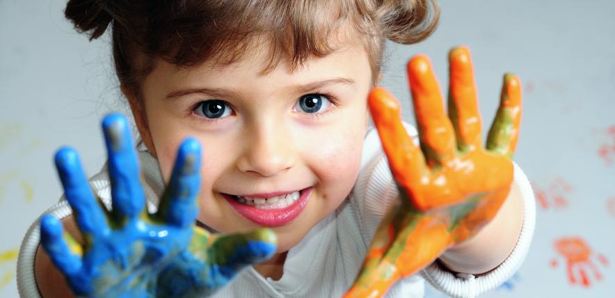 Child with painted hands