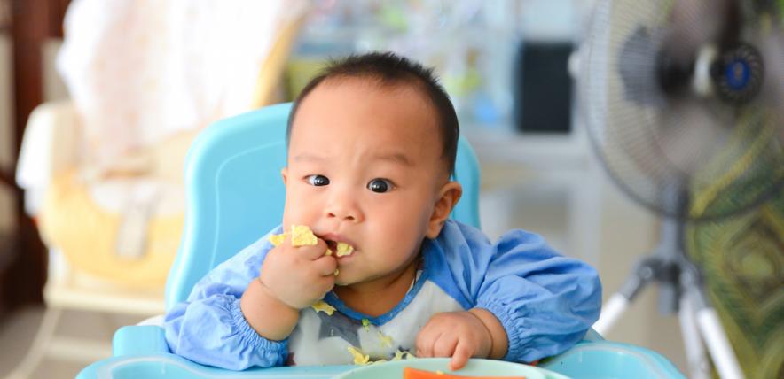 Baby weaning - eating in high chair