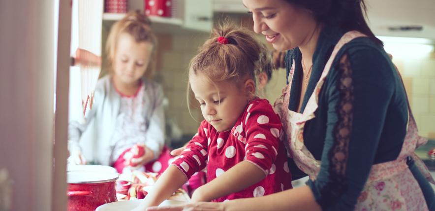 Mother cooking with children