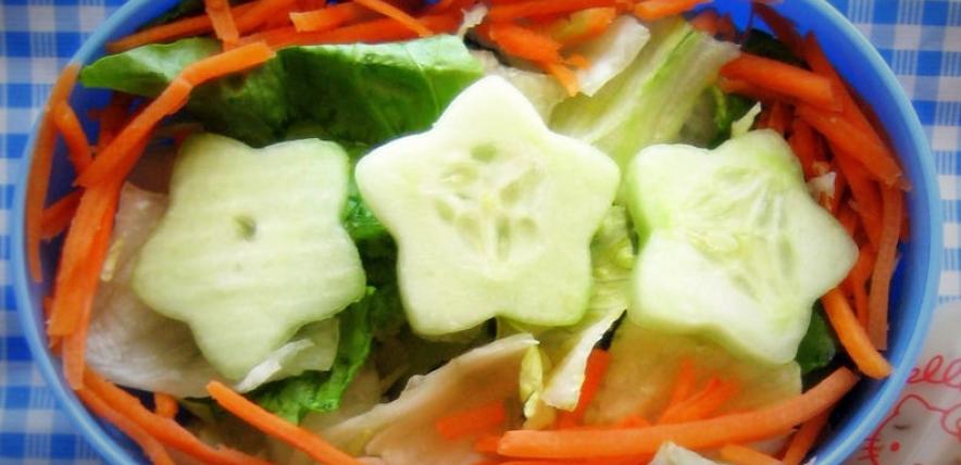 A healthy salad in lunchbox by AJ Gazmen