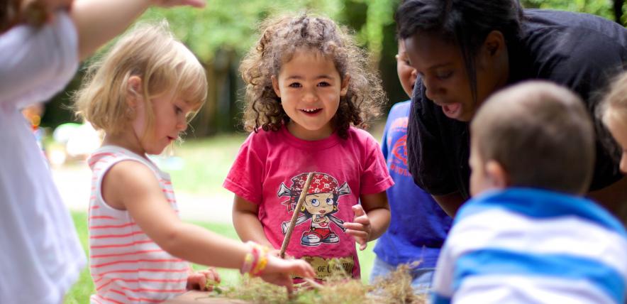 children crafting outdoors, early years education and play