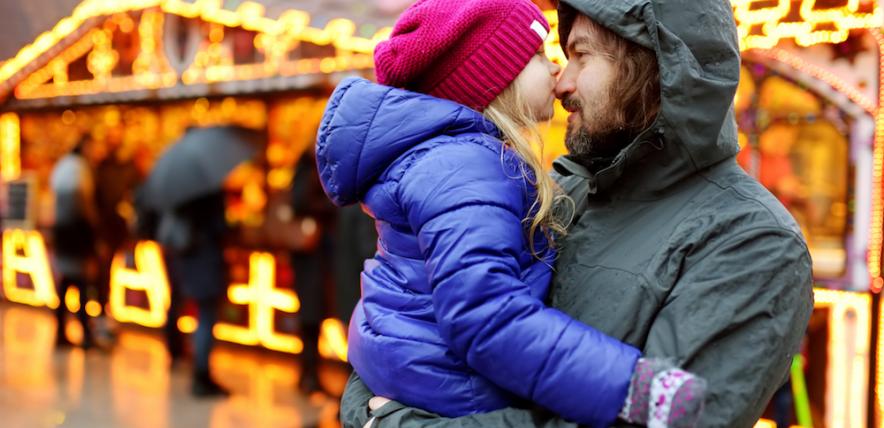 Single parent dad with his daughter at Christmas time